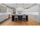 Bright kitchen featuring a large island, white cabinets and stainless steel appliances at 4921 Slaton Dr, Acworth, GA 30101