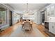 Open concept kitchen and dining area with stainless appliances and bar area at 4921 Slaton Dr, Acworth, GA 30101