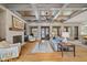 Inviting living room with fireplace, hardwood floors, and coffered ceilings at 4921 Slaton Dr, Acworth, GA 30101