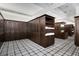 A spacious locker room with wood lockers, ample storage, and a neatly patterned carpet at 4921 Slaton Dr, Acworth, GA 30101