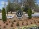 Community entrance sign surrounded by lush landscaping and seasonal flowers, welcomes you to Governors Towne Club at 4921 Slaton Dr, Acworth, GA 30101