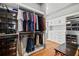 Spacious walk-in closet with custom shelving, drawers, and hanging racks for optimal organization at 4921 Slaton Dr, Acworth, GA 30101