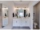 Double vanity bathroom with a well-lit mirror and ample counter space at 197 Saddleridge Dr, Bremen, GA 30110