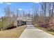 Lovely brick home boasts a two-car garage and long driveway at 197 Saddleridge Dr, Bremen, GA 30110