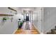 Inviting hallway with wood floors, decor, and stairs leading to the upper level at 197 Saddleridge Dr, Bremen, GA 30110