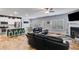 Open concept living room and kitchen with modern furniture and fireplace at 197 Saddleridge Dr, Bremen, GA 30110