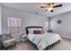 Comfortable bedroom with ceiling fan, neutral colors, and ample natural light at 197 Saddleridge Dr, Bremen, GA 30110