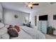 Relaxing bedroom with ceiling fan, desk, and ensuite bathroom at 197 Saddleridge Dr, Bremen, GA 30110