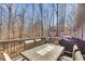 Relax on the patio with table and chairs and enjoy views of the woods at 197 Saddleridge Dr, Bremen, GA 30110