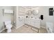 Well-lit bathroom with double sinks, mirrors, and ample counter space at 3540 Chattahoochee Summit Se Ln # 28, Atlanta, GA 30339