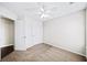 Bedroom features neutral walls and plush carpet, complemented by a ceiling fan at 3540 Chattahoochee Summit Se Ln # 28, Atlanta, GA 30339