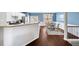 Cozy dining area adjacent to the kitchen, featuring stylish blue wall and nice window at 3540 Chattahoochee Summit Se Ln # 28, Atlanta, GA 30339
