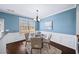 Charming dining area with wainscoting, chandelier, and plenty of natural light at 3540 Chattahoochee Summit Se Ln # 28, Atlanta, GA 30339