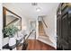 Bright entryway with hardwood floors and staircase leading to the upper level at 3540 Chattahoochee Summit Se Ln # 28, Atlanta, GA 30339