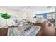Bright and airy living area connected to the dining and kitchen spaces at 3540 Chattahoochee Summit Se Ln # 28, Atlanta, GA 30339
