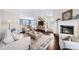 Open-concept living room features a fireplace and seamless flow to other spaces at 3540 Chattahoochee Summit Se Ln # 28, Atlanta, GA 30339