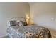 Cozy bedroom featuring a decorative bedframe, soft lighting, and neutral decor at 60 Streamside Dr, Covington, GA 30016
