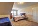 Bedroom with two beds, a window and nearby door at 60 Streamside Dr, Covington, GA 30016