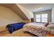 Bedroom with two beds and plenty of natural light from window at 60 Streamside Dr, Covington, GA 30016
