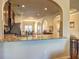Kitchen with granite counters and an open concept layout to the dining room at 60 Streamside Dr, Covington, GA 30016