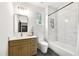 Clean and bright bathroom featuring a marble tiled shower/bathtub combination with vanity and modern fixtures at 1171 State St # B, Atlanta, GA 30318