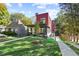 A modern home boasts a covered porch, brick accents, and a spacious, well-manicured lawn at 1171 State St # B, Atlanta, GA 30318