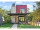 Modern two-story home featuring brick accents, a covered porch, and a well-manicured lawn at 1171 State St # B, Atlanta, GA 30318