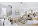 Spacious living room with modern décor and an open layout leading to the kitchen and stairway at 1171 State St # B, Atlanta, GA 30318