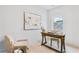 Bright office space with natural light, featuring a wooden desk, comfortable seating, and minimalist decor at 1171 State St # B, Atlanta, GA 30318