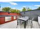 Outdoor kitchen and rooftop deck space featuring a stainless steel outdoor kitchen, sleek countertops, and modern seating at 1171 State St # B, Atlanta, GA 30318