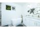 Elegant bathroom featuring double sinks, a soaking tub, and stylish finishes at 224 Ormond Sw St # A, Atlanta, GA 30315