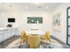 Dining area with white walls, wood floors, a modern painting, seating for four, and natural light at 224 Ormond Sw St # A, Atlanta, GA 30315