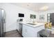 Bright, modern kitchen with stainless steel appliances, a white countertop island, and hardwood flooring at 224 Ormond Sw St # A, Atlanta, GA 30315