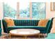 Living room featuring comfortable seating, a round marble top table, and a view of the backyard at 224 Ormond Sw St # A, Atlanta, GA 30315