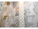 Detailed view of a luxurious shower with ornate tile and brass fixtures at 224 Ormond Sw St # A, Atlanta, GA 30315