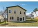 Home exterior features a spacious backyard and lawn at 2312 Herring Sw Rd, Atlanta, GA 30311