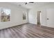 Bedroom boasts natural light and gray floors, with a view of outside at 2312 Herring Sw Rd, Atlanta, GA 30311
