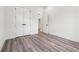 A bedroom with white walls, a ceiling fan, and a closet at 2312 Herring Sw Rd, Atlanta, GA 30311