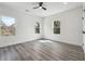 Spacious bedroom features three windows offering plenty of natural light and views at 2312 Herring Sw Rd, Atlanta, GA 30311