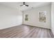 Spacious bedroom features wood-look flooring and plenty of natural light at 2312 Herring Sw Rd, Atlanta, GA 30311