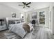 Spacious bedroom featuring a luxurious bed, large windows, and a dedicated workspace at 2312 Herring Sw Rd, Atlanta, GA 30311