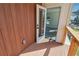 Outdoor porch with a view looking into the home with an open glass door at 2312 Herring Sw Rd, Atlanta, GA 30311