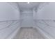 Walk-in closet with wire shelving, providing ample storage space for clothing and accessories at 656 Avondale Park Cir, Decatur, GA 30032