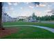 Expansive green space for residents to enjoy, including walking paths and seating areas at 656 Avondale Park Cir, Decatur, GA 30032