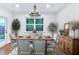 Dining room boasts hardwood floors and ample space for Gathering gatherings at 656 Avondale Park Cir, Decatur, GA 30032