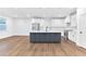 Spacious open kitchen features white cabinets, a center island, and stainless steel appliances at 656 Avondale Park Cir, Decatur, GA 30032