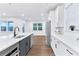 Modern kitchen features a center island, stainless steel appliances, and ample counter space at 656 Avondale Park Cir, Decatur, GA 30032