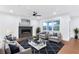 Bright living room features a fireplace, hardwood floors, and lots of natural light at 656 Avondale Park Cir, Decatur, GA 30032