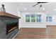 Bright living room features a fireplace, hardwood floors, and lots of natural light at 656 Avondale Park Cir, Decatur, GA 30032