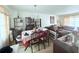 Bright dining room with a chandelier and view of the comfortable living room, perfect for entertaining and Gathering meals at 1979 Se Bencal Se Dr, Atlanta, GA 30316